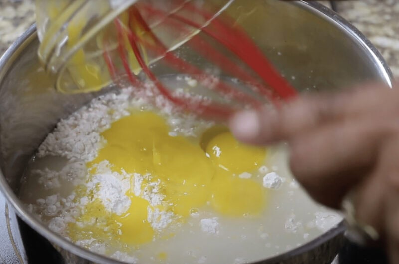 preparing filling for lemon meringue pie
